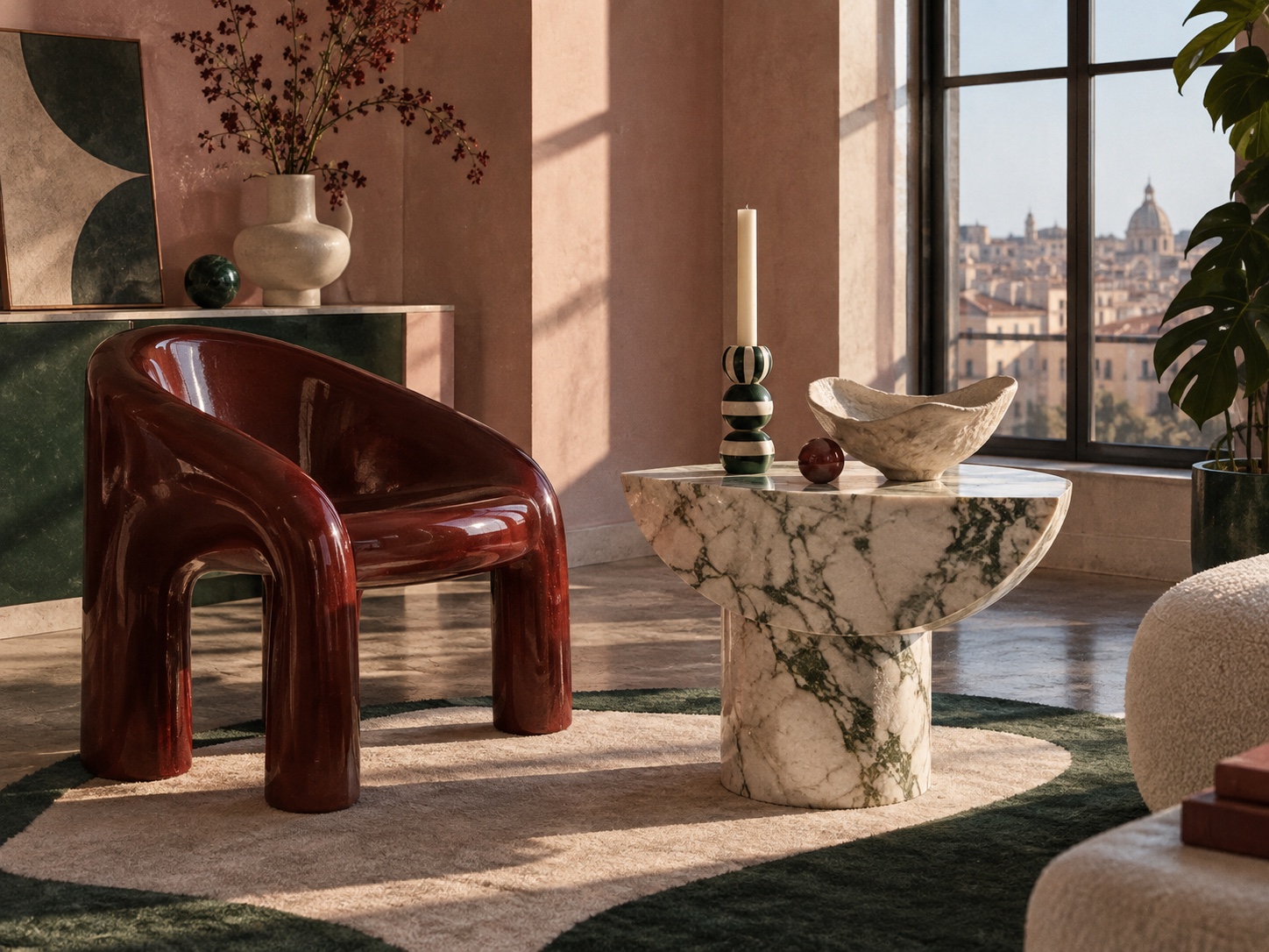A lacquered oxblood chair, half-moon marble table and striped candleholder form a sunlit postmodern interior.